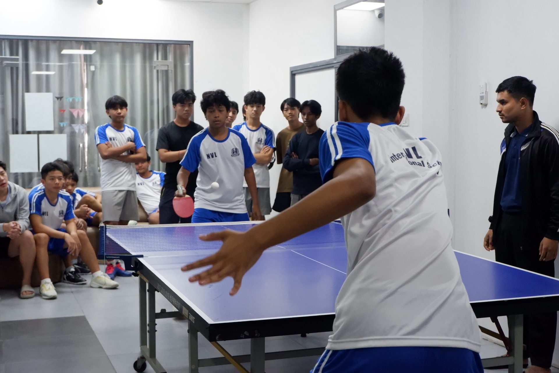 Students participating in table tennis